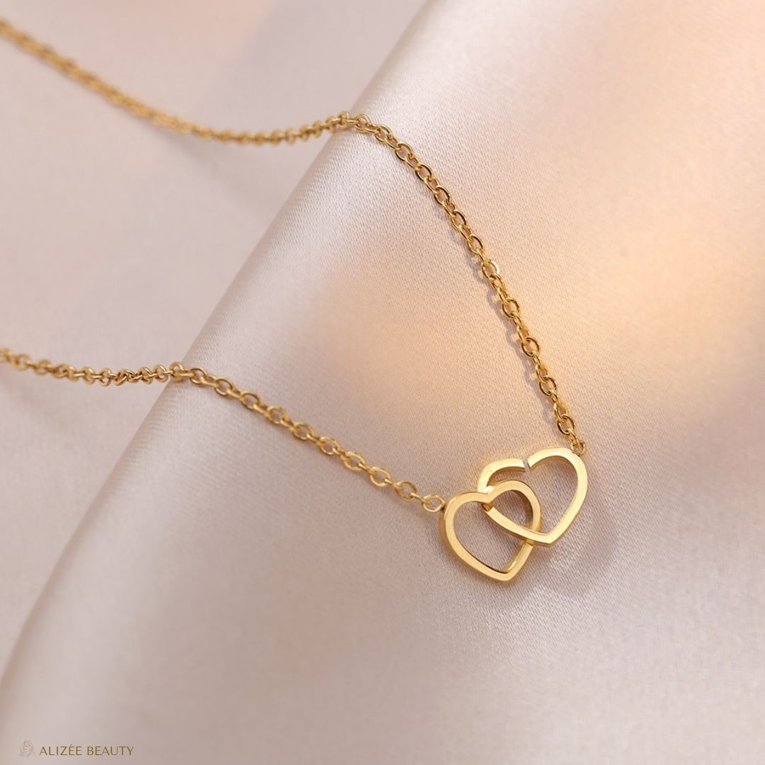 Bijoux collier double cœur en acier
- Alizée Beauty