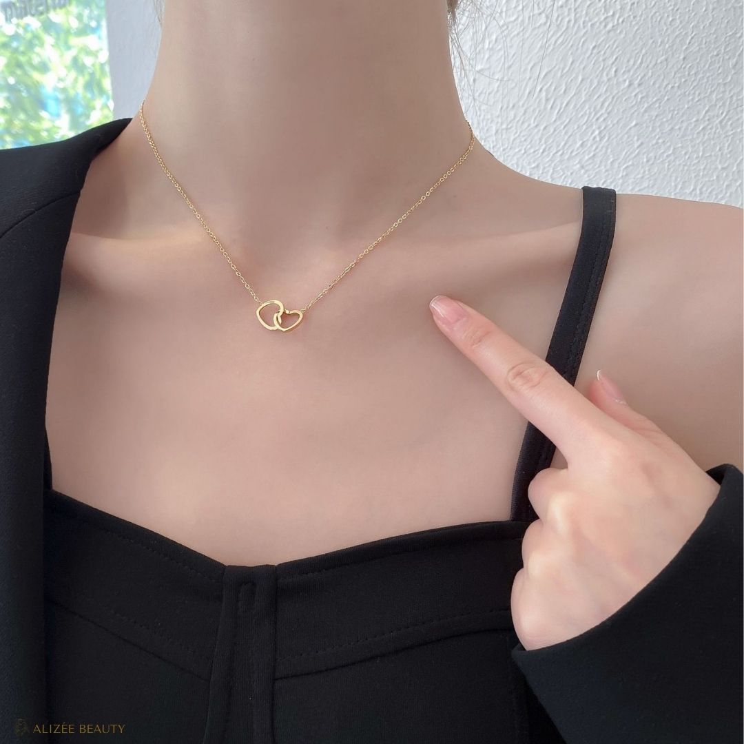 Bijoux collier double cœur acier  au titane - Alizée Beauty